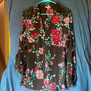 Gently used Candie’s button down blouse. Size large.